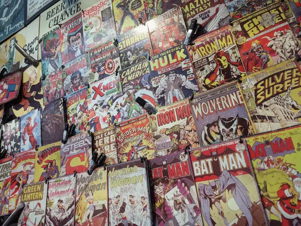 A wall of comic books from a collection